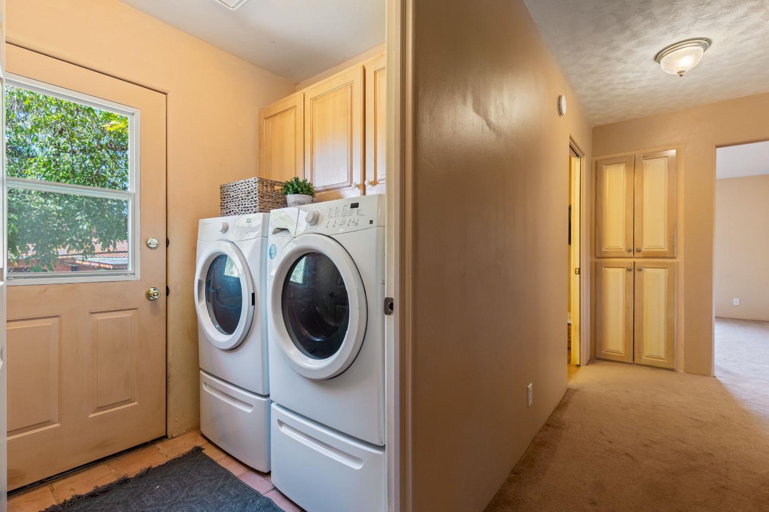13587 Garden Bar Road Grass Valley, CA 95949 - Photo 29 of 70 a view of a bedroom with washer and dryer