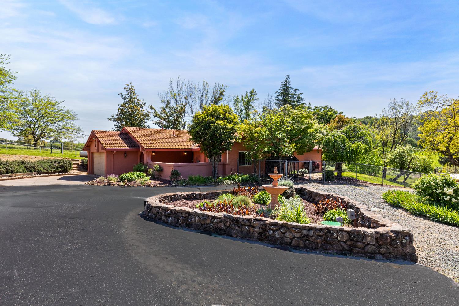 13587 Garden Bar Road Grass Valley, CA 95949 - Photo 3 of 70 a view of a backyard with plants and outdoor seating