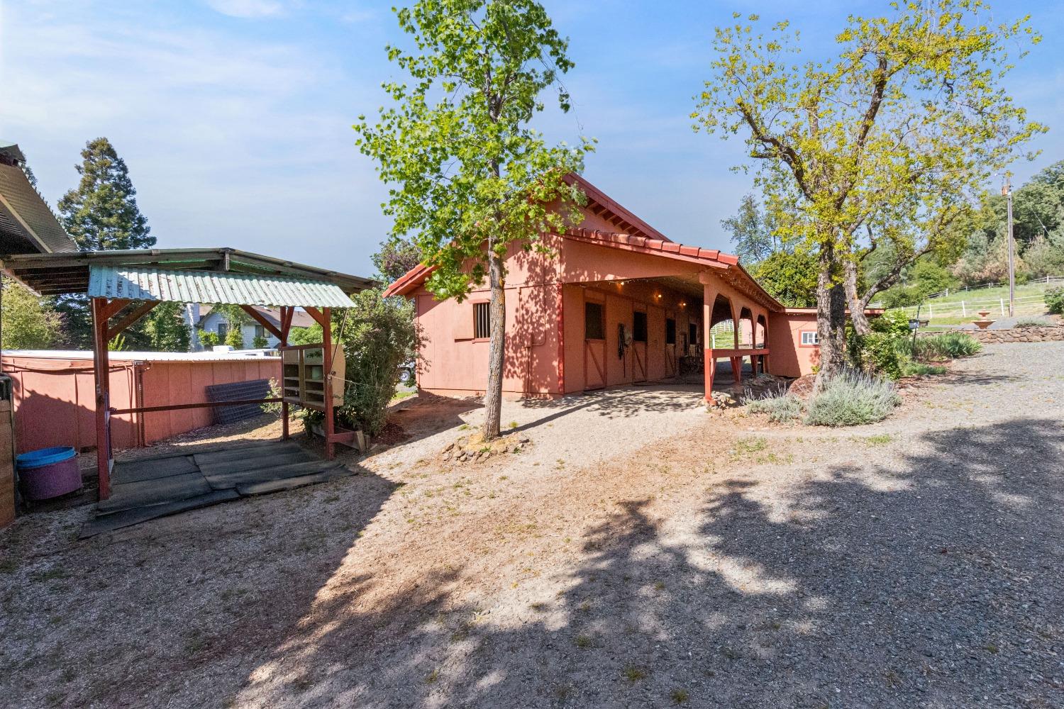 13587 Garden Bar Road Grass Valley, CA 95949 - Photo 33 of 70 a view of a house with a yard