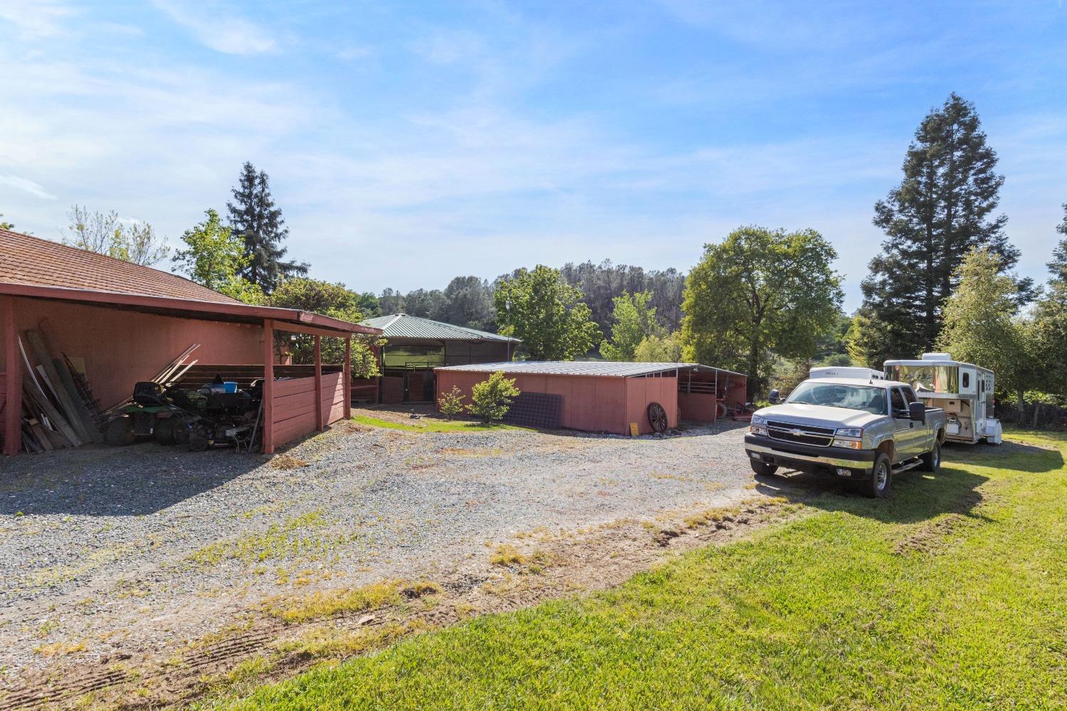 13587 Garden Bar Road Grass Valley, CA 95949 - Photo 37 of 70 a car parked in front of a house