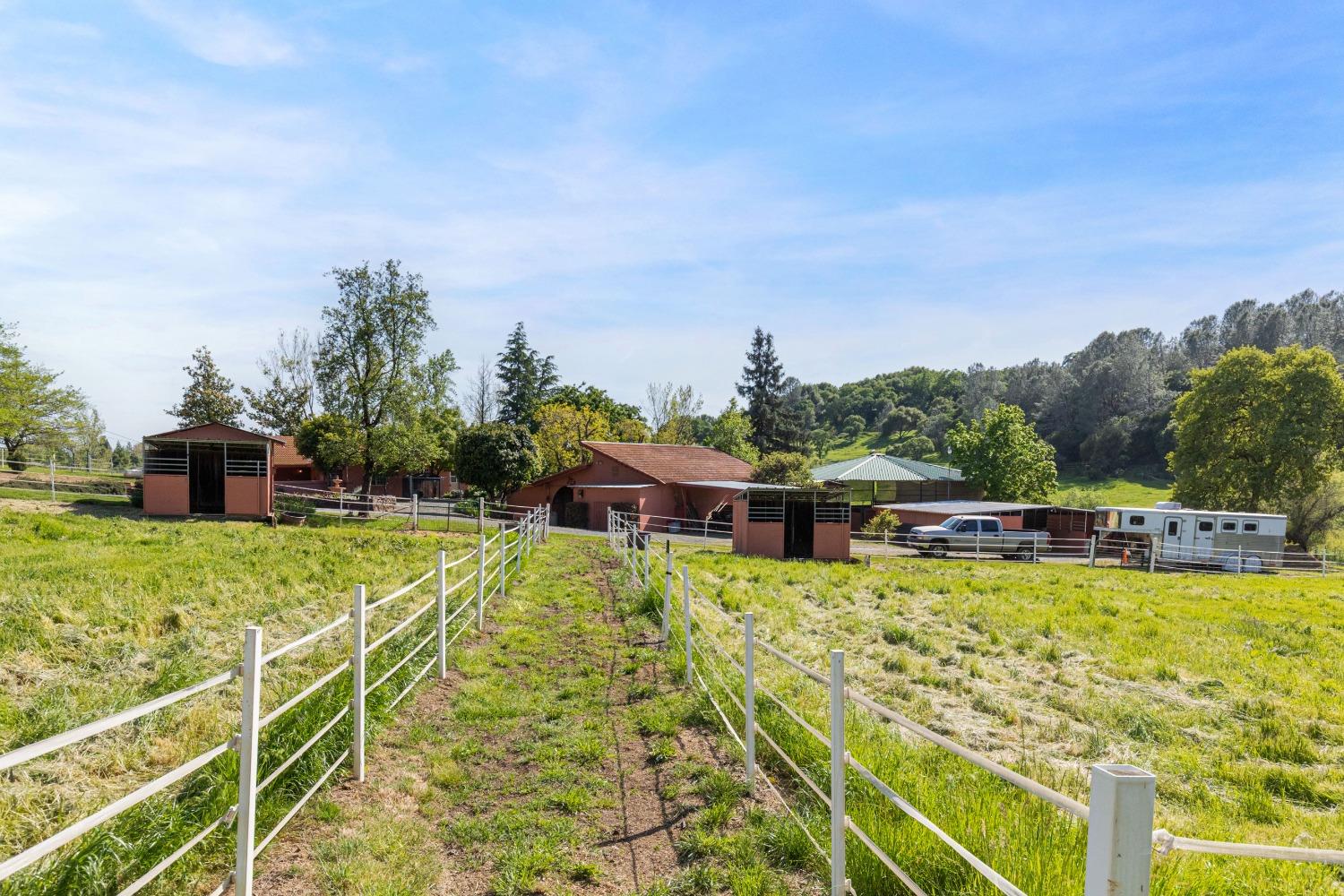 13587 Garden Bar Road Grass Valley, CA 95949 - Photo 38 of 70 a view of a swimming pool with a patio and a yard