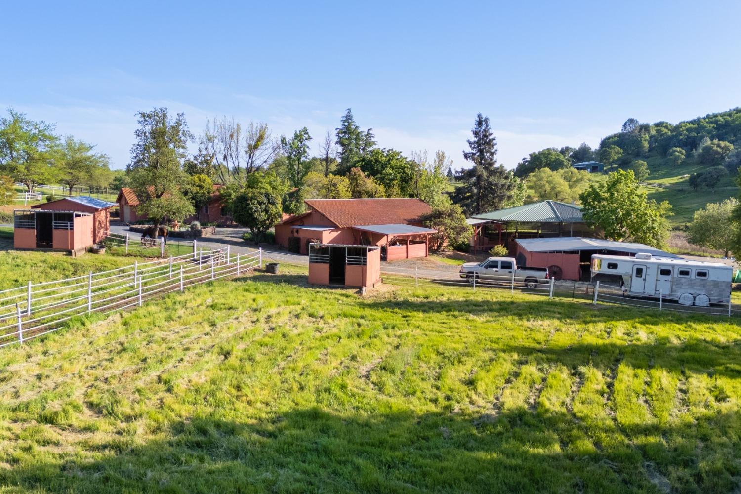 13587 Garden Bar Road Grass Valley, CA 95949 - Photo 42 of 70 a view of a swimming pool with a patio