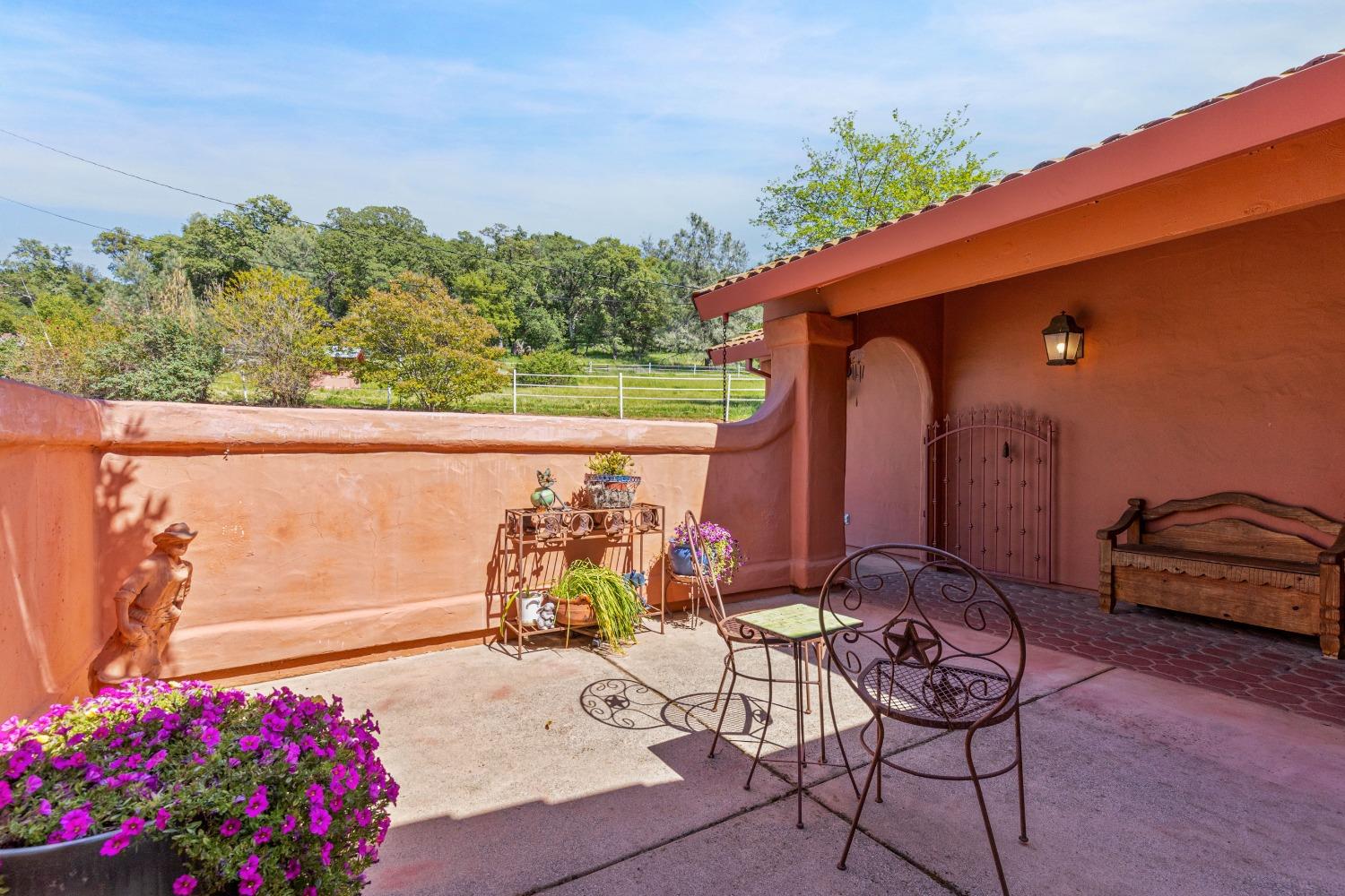 13587 Garden Bar Road Grass Valley, CA 95949 - Photo 45 of 70 a front view of a house with outdoor seating