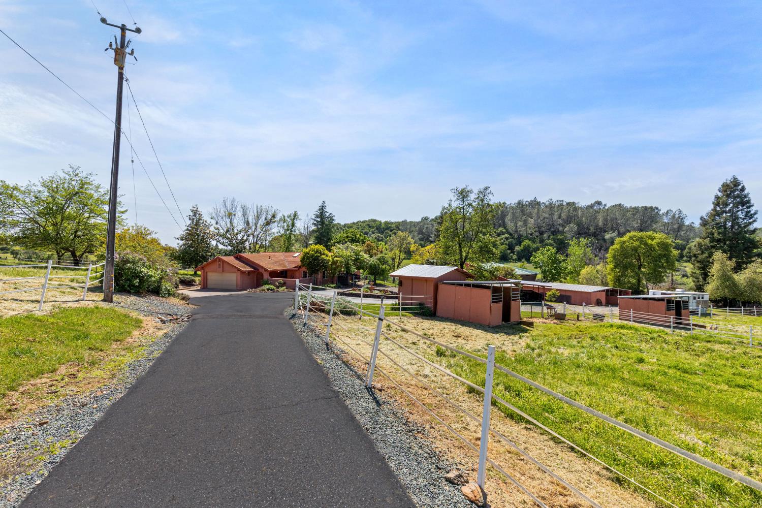 13587 Garden Bar Road Grass Valley, CA 95949 - Photo 49 of 70 a view of a swimming pool with a chairs