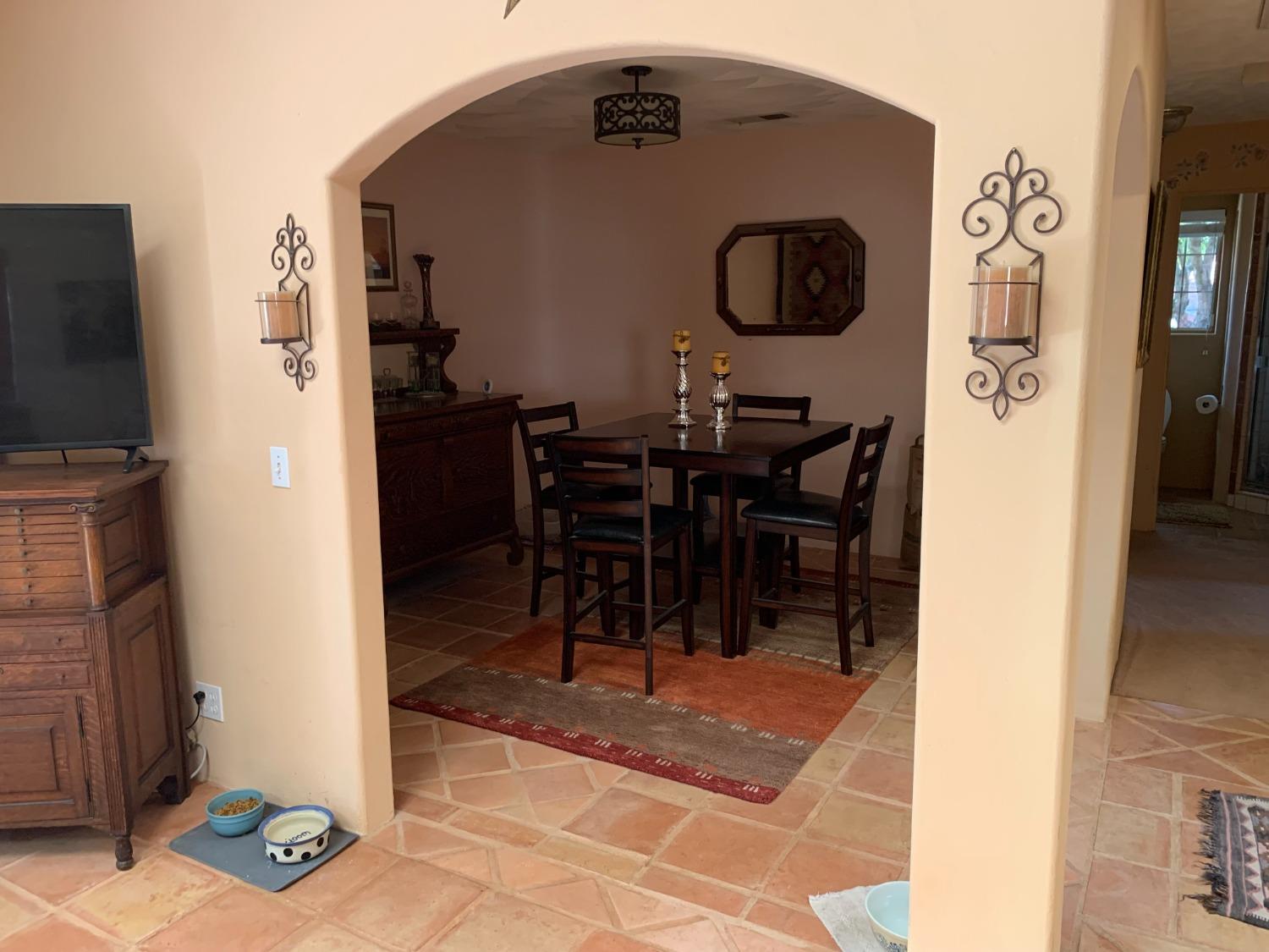 13587 Garden Bar Road Grass Valley, CA 95949 - Photo 59 of 70 a view of a dinning room with furniture