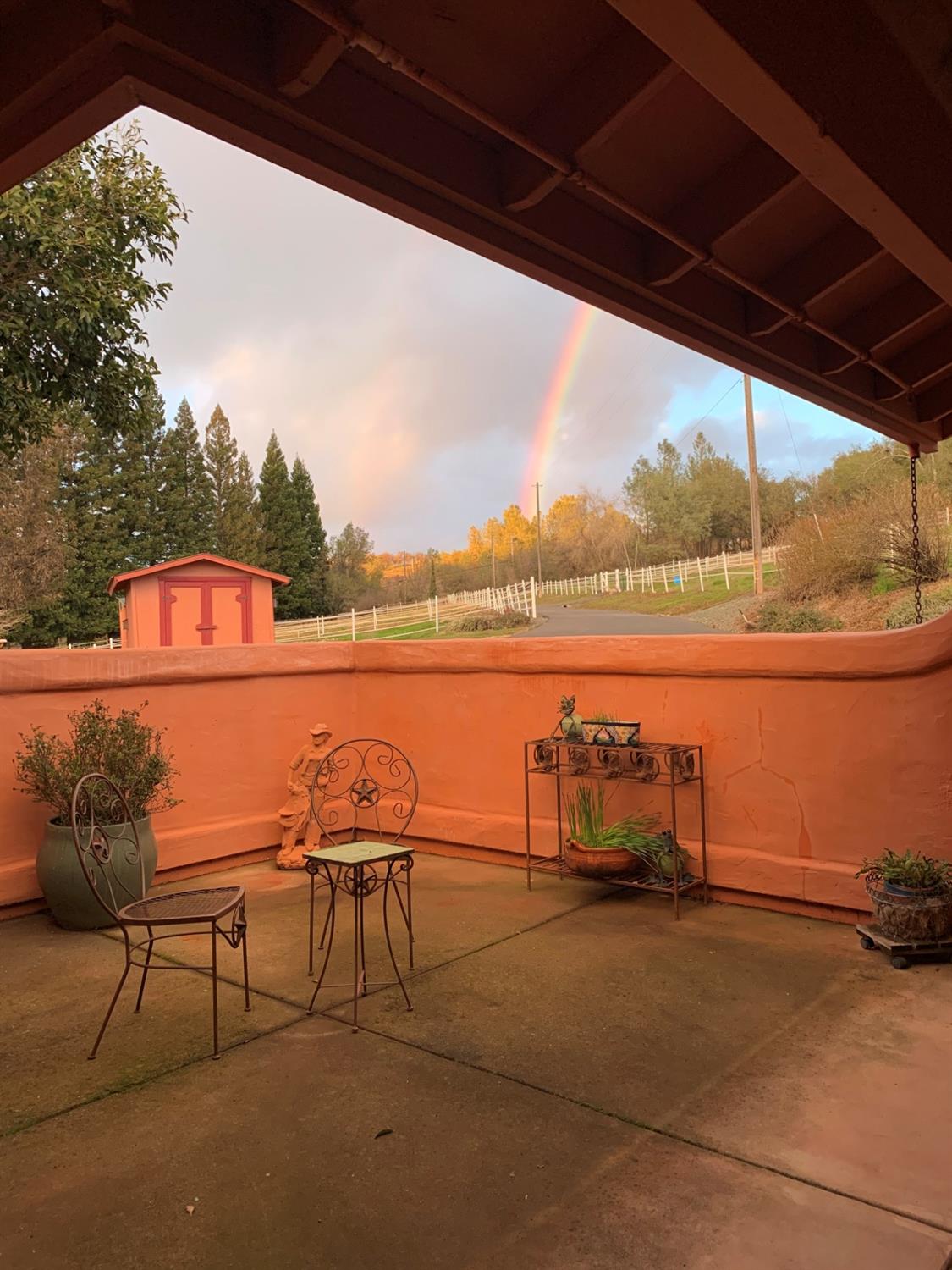 13587 Garden Bar Road Grass Valley, CA 95949 - Photo 66 of 70 a balcony with furniture and city view