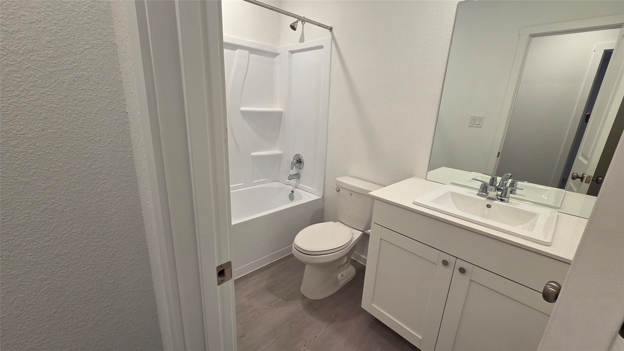 110 Canadian Cove Kyle, TX 78640 - Photo 13 of 20 a bathroom with a toilet sink and mirror