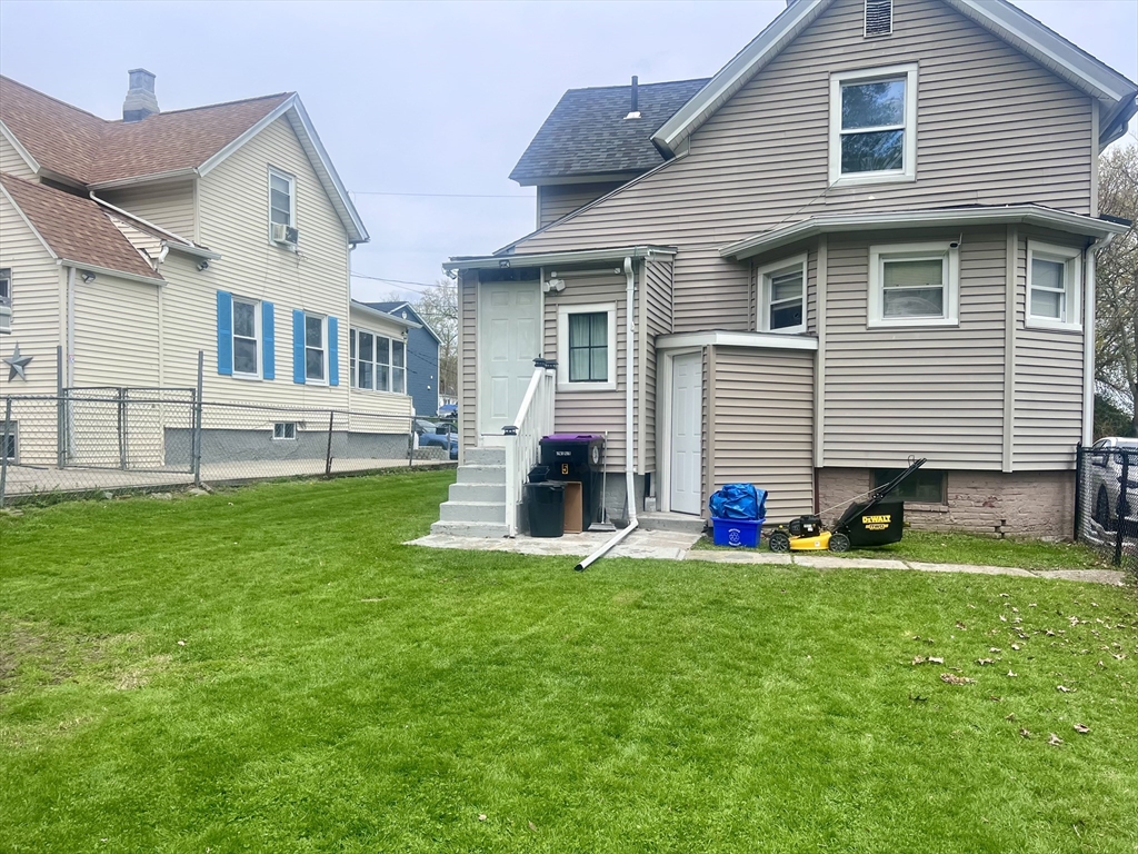 5 Vernon Street Holyoke, MA 01040 - Photo 3 of 12 a house that has a big yard