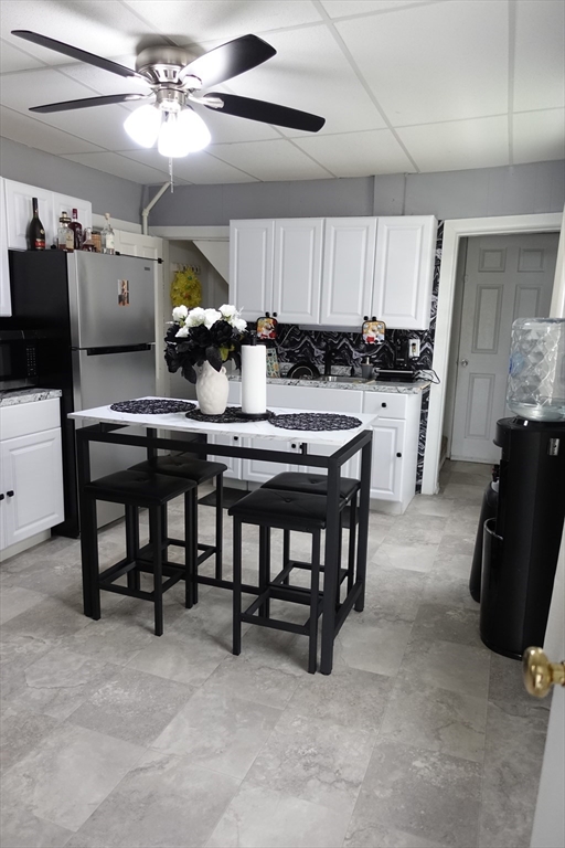 5 Vernon Street Holyoke, MA 01040 - Photo 5 of 12 a view of a dining room with furniture