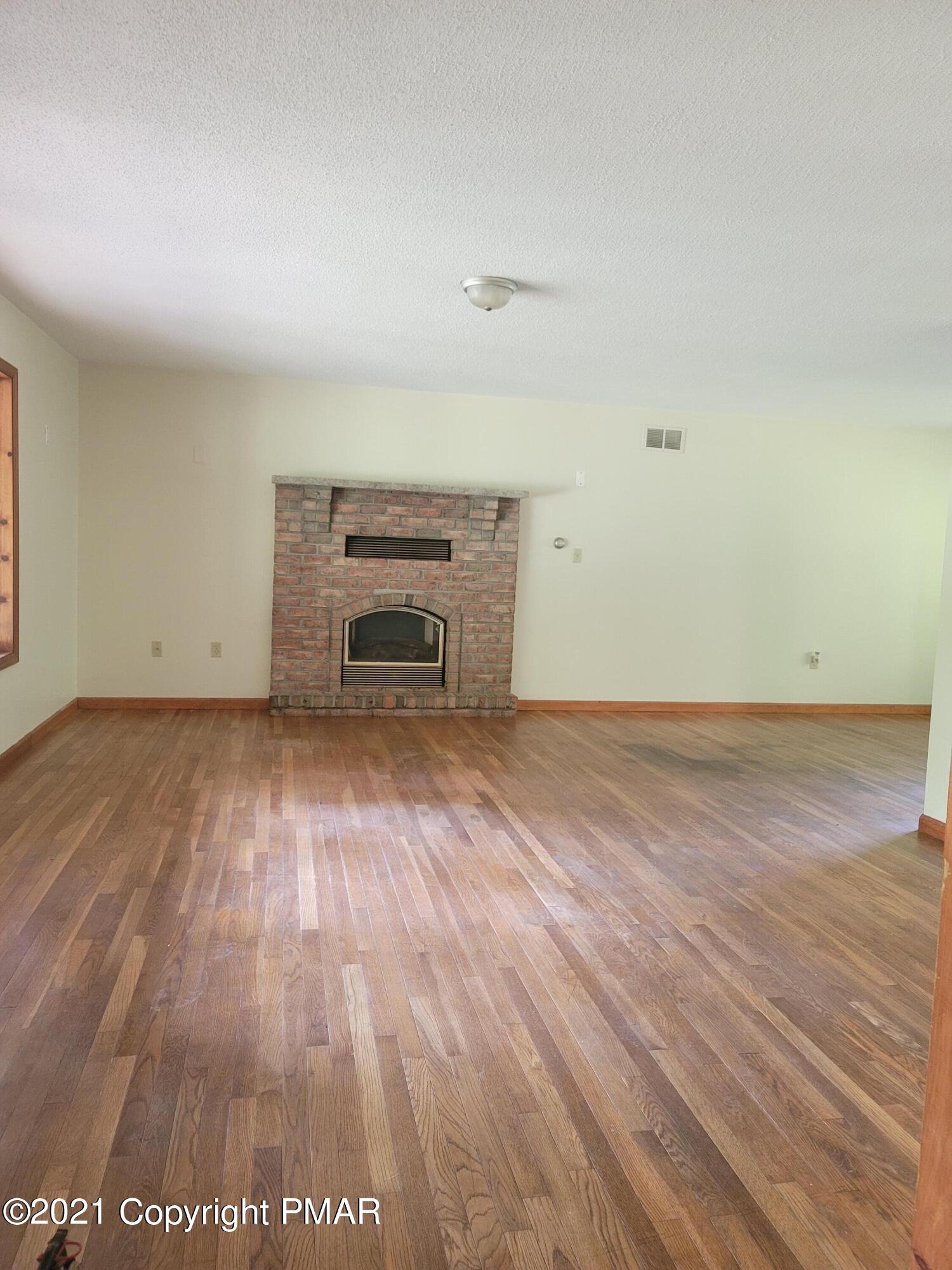 2111 Wilderland Road Tamiment, PA 18371 - Photo 5 of 41 Living Room
