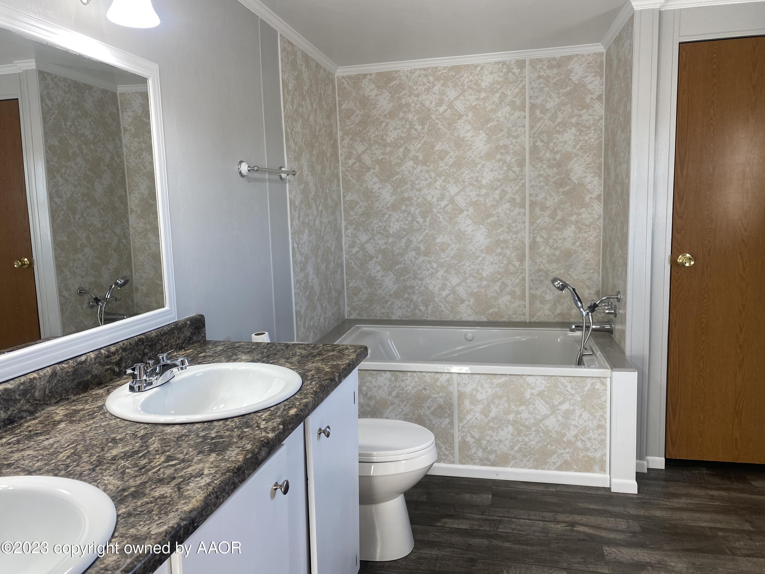 517 Muskrat Road Fritch, TX 79036 - Photo 16 of 54 Owner’s bath 1