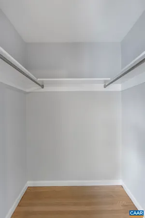 a view of staircase with white walls and stairs
