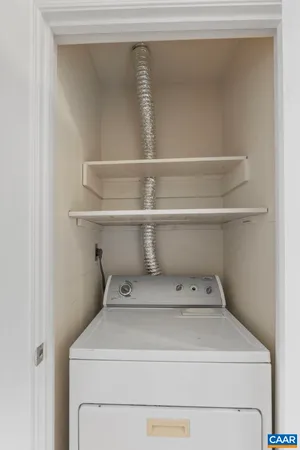 a view of a room with racks on the wall