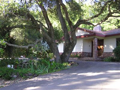 6600 Warehill Road Santa Rosa, CA 95404 - Photo 1 of 6 a front view of a house with garden