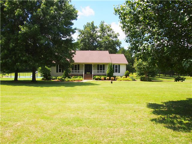 2848 Bolton Road Columbia, TN 38401 - Photo 1 of 20 a swimming pool with outdoor seating and yard
