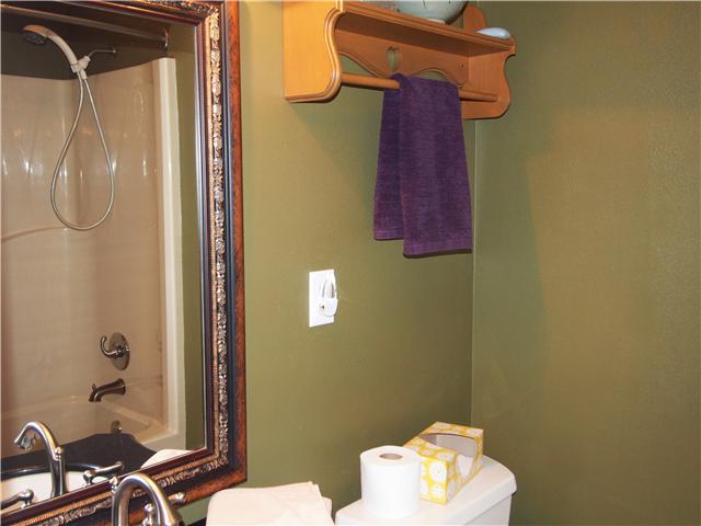 2848 Bolton Road Columbia, TN 38401 - Photo 13 of 20 a bathroom with a shower curtain