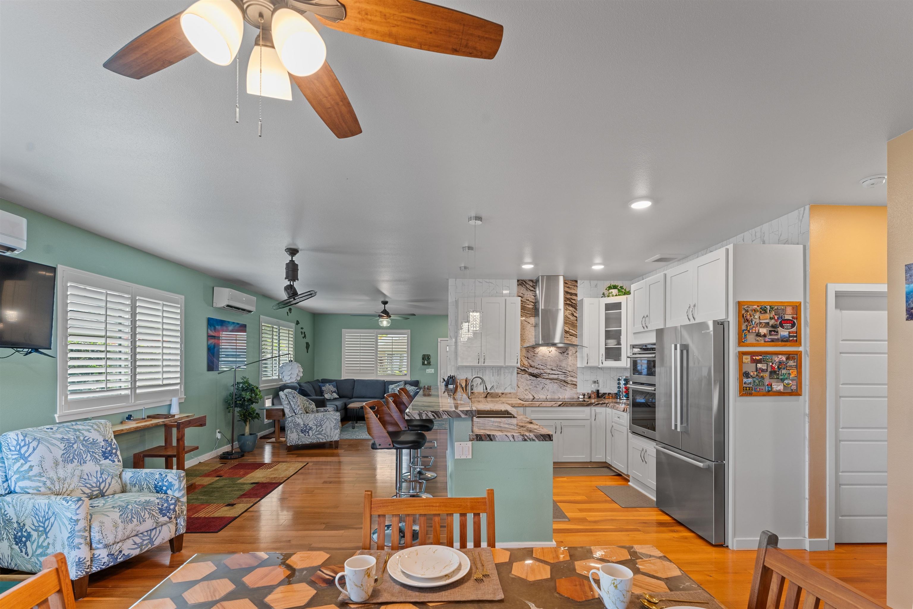 112 Kili'o'opu Street Wailuku, HI 96793 - Photo 12 of 49 a living room with lots of furniture and kitchen view