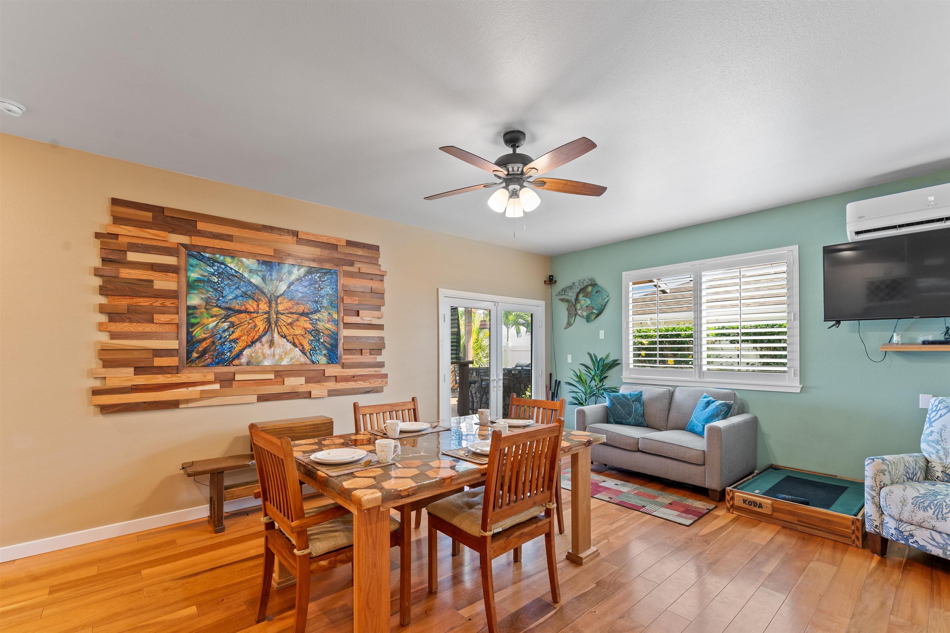 112 Kili'o'opu Street Wailuku, HI 96793 - Photo 13 of 49 a living room with furniture and a flat screen tv