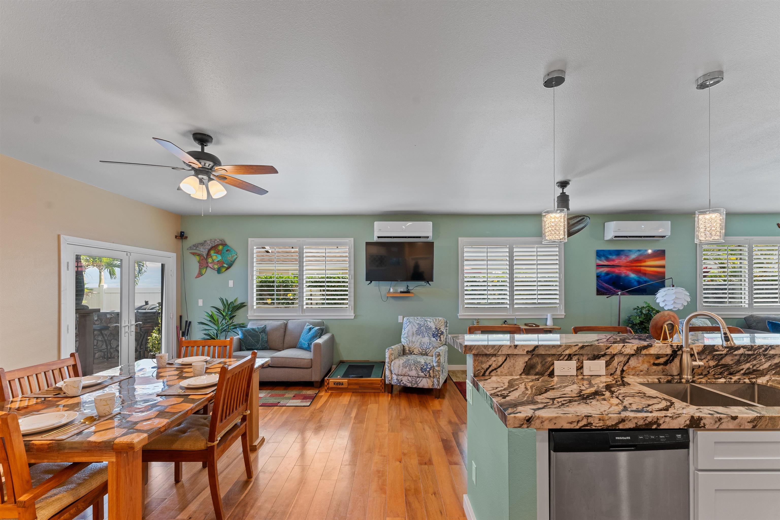 112 Kili'o'opu Street Wailuku, HI 96793 - Photo 14 of 49 a living room with furniture and a flat screen tv