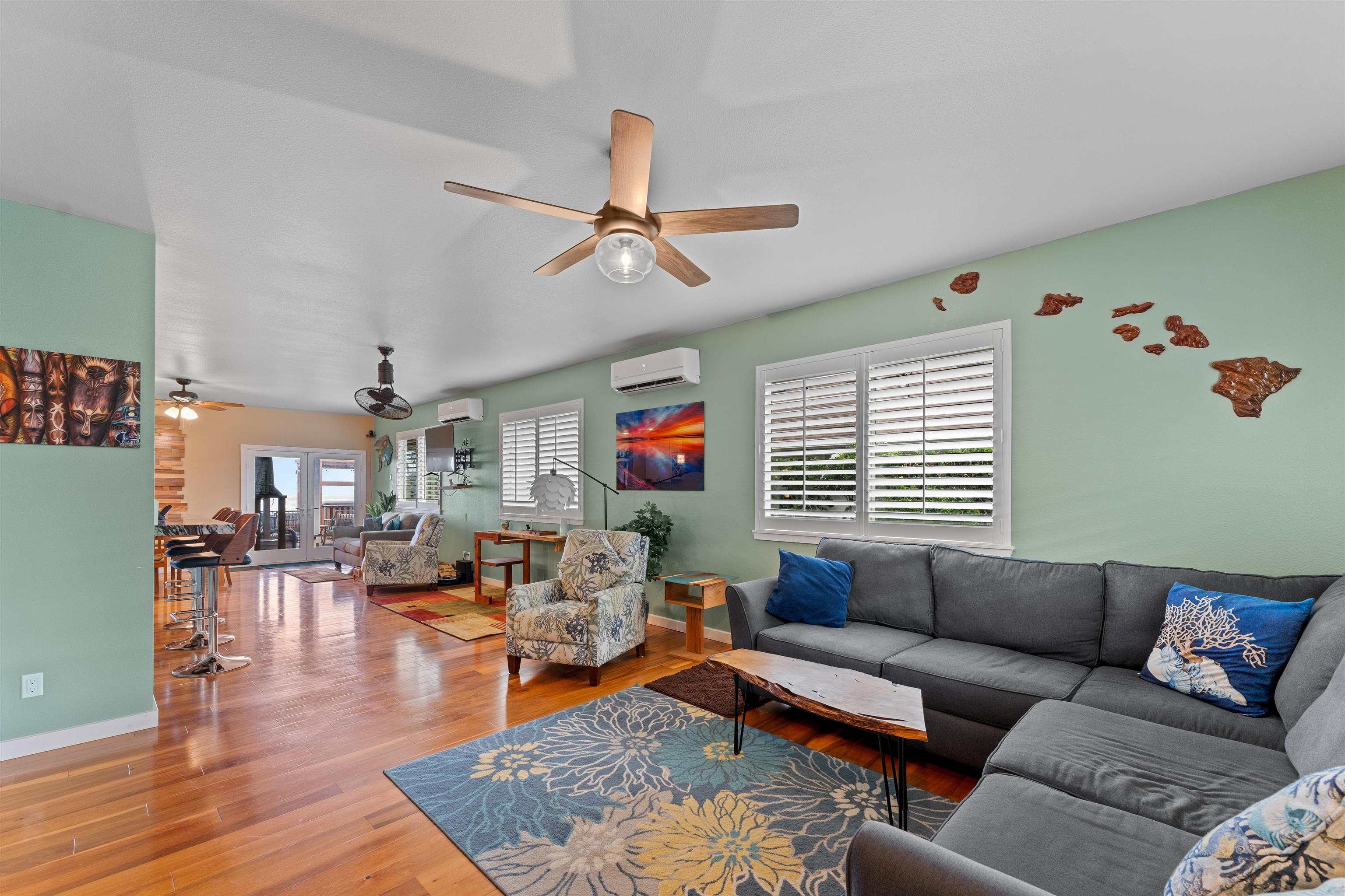 112 Kili'o'opu Street Wailuku, HI 96793 - Photo 20 of 49 a living room with furniture and wooden floor