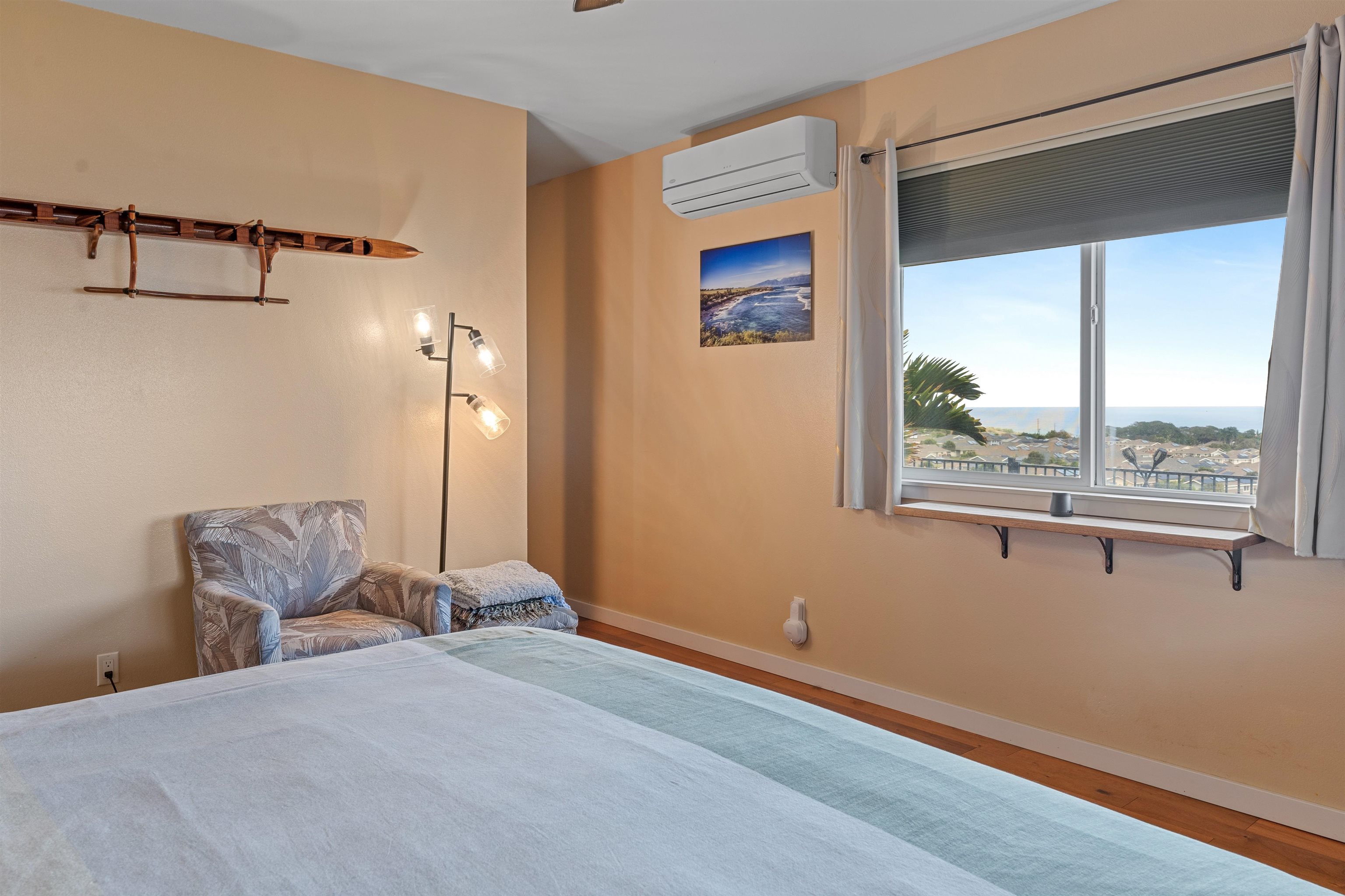 112 Kili'o'opu Street Wailuku, HI 96793 - Photo 21 of 49 a bedroom with a bed and a window