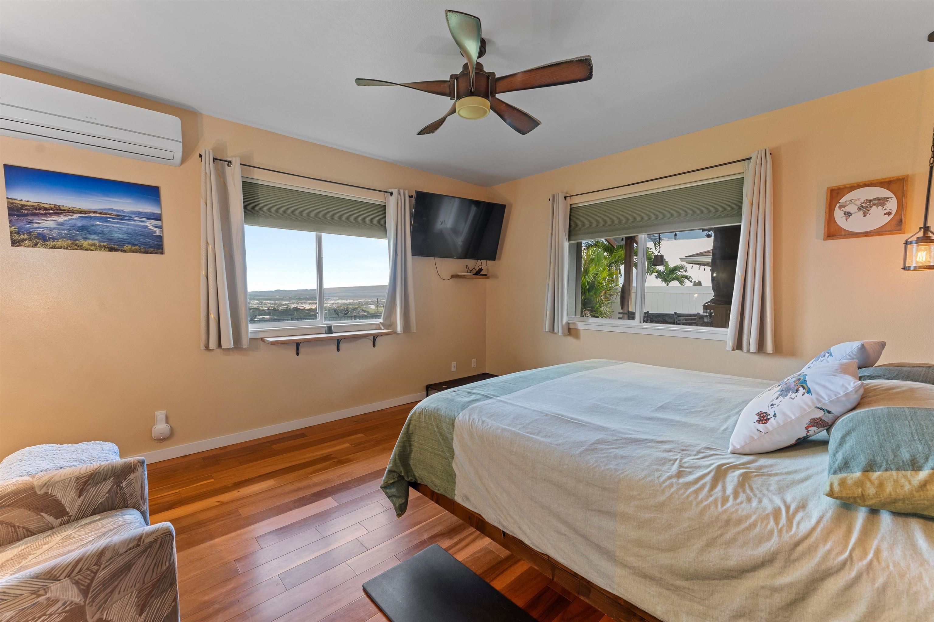 112 Kili'o'opu Street Wailuku, HI 96793 - Photo 24 of 49 a bedroom with a bed and a window