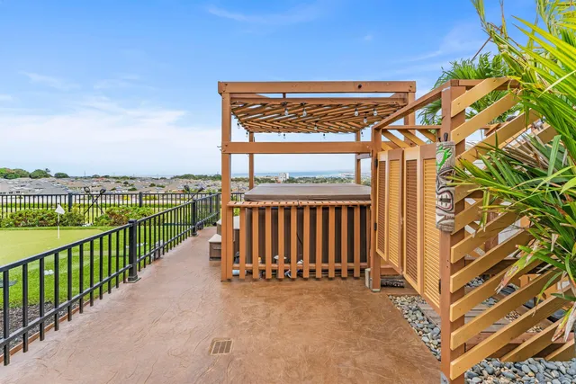 a view of a balcony with an outdoor space