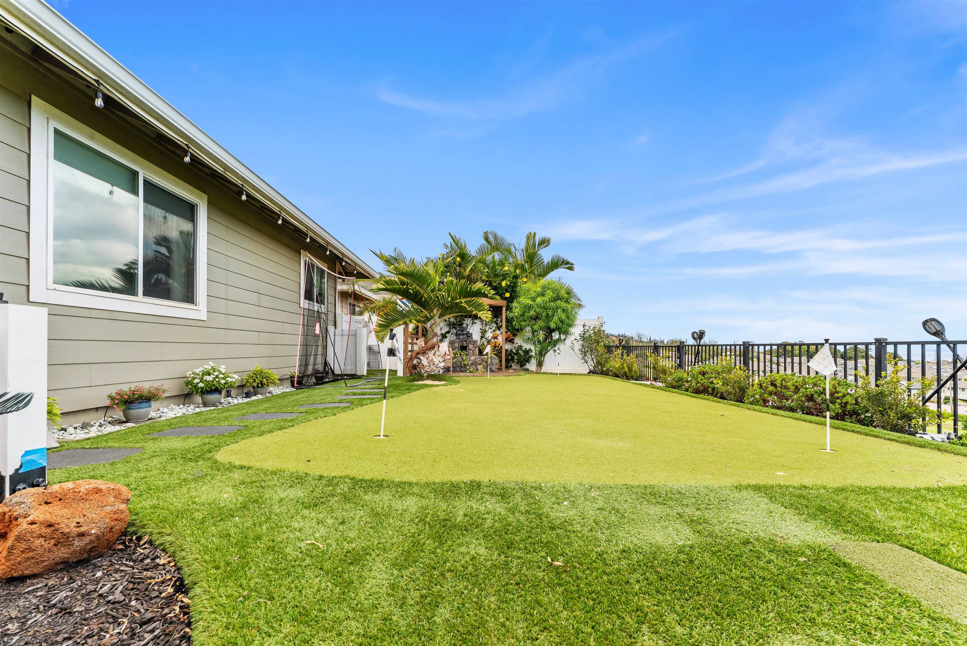 112 Kili'o'opu Street Wailuku, HI 96793 - Photo 38 of 49 a view of an house with backyard and basketball court