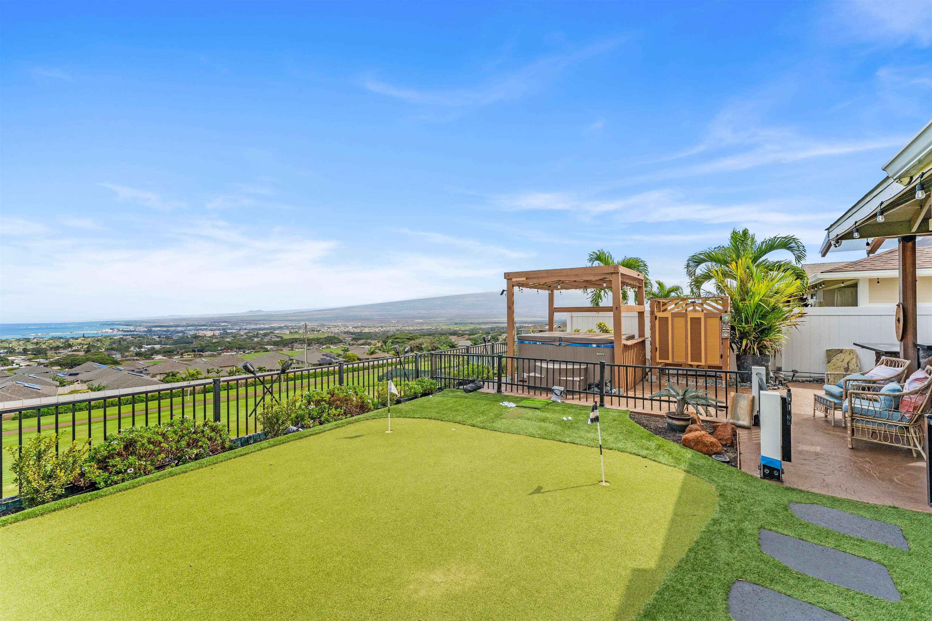 112 Kili'o'opu Street Wailuku, HI 96793 - Photo 42 of 49 a view of a swimming pool with a lounge chair