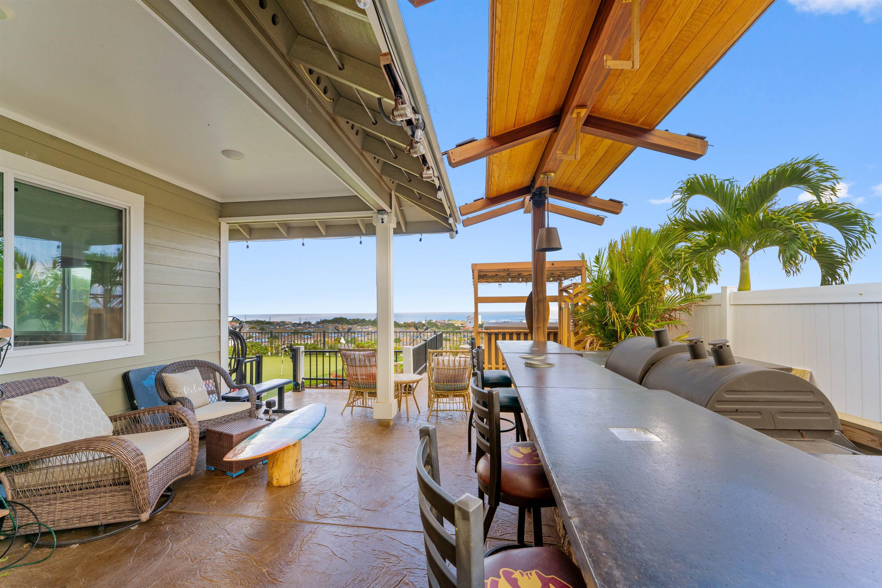112 Kili'o'opu Street Wailuku, HI 96793 - Photo 8 of 49 a living room with furniture and floor to ceiling windows
