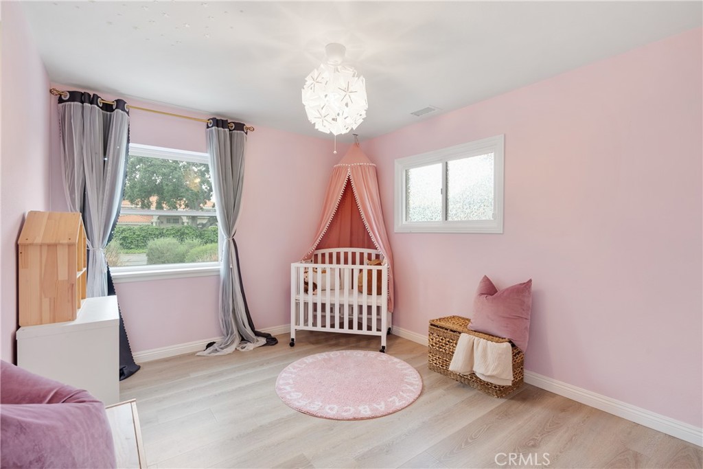 165 West Palm Drive Arcadia, CA 91007 - Photo 21 of 30 a living room with furniture and a window