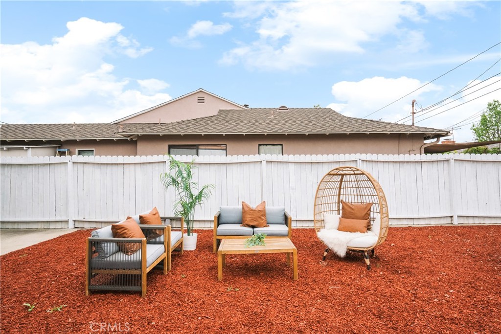 165 West Palm Drive Arcadia, CA 91007 - Photo 26 of 30 a backyard of a house with table and chairs