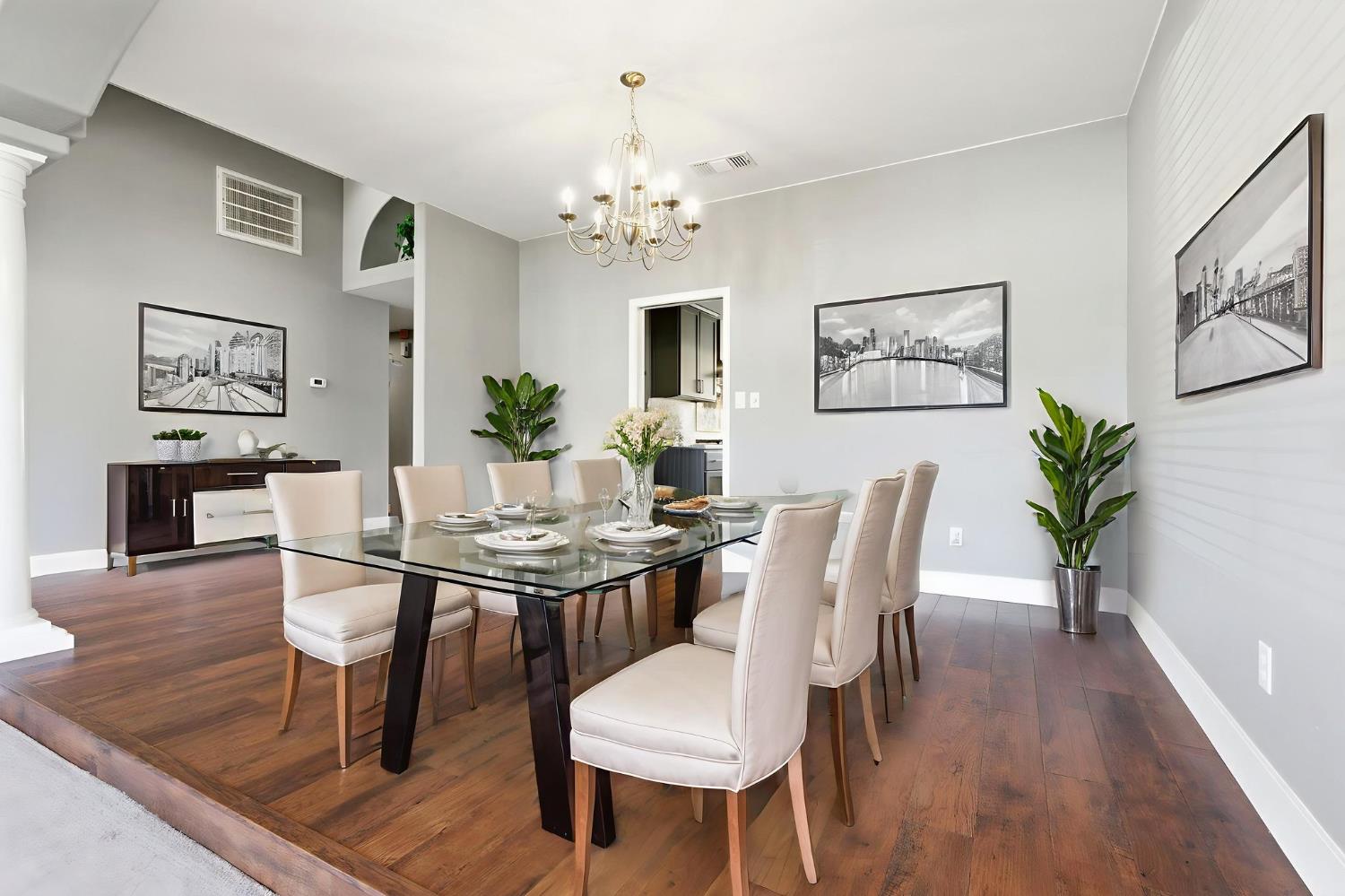 13201 Meacham Road Bakersfield, CA 93314 - Photo 17 of 62 a view of a dining room with furniture and wooden floor