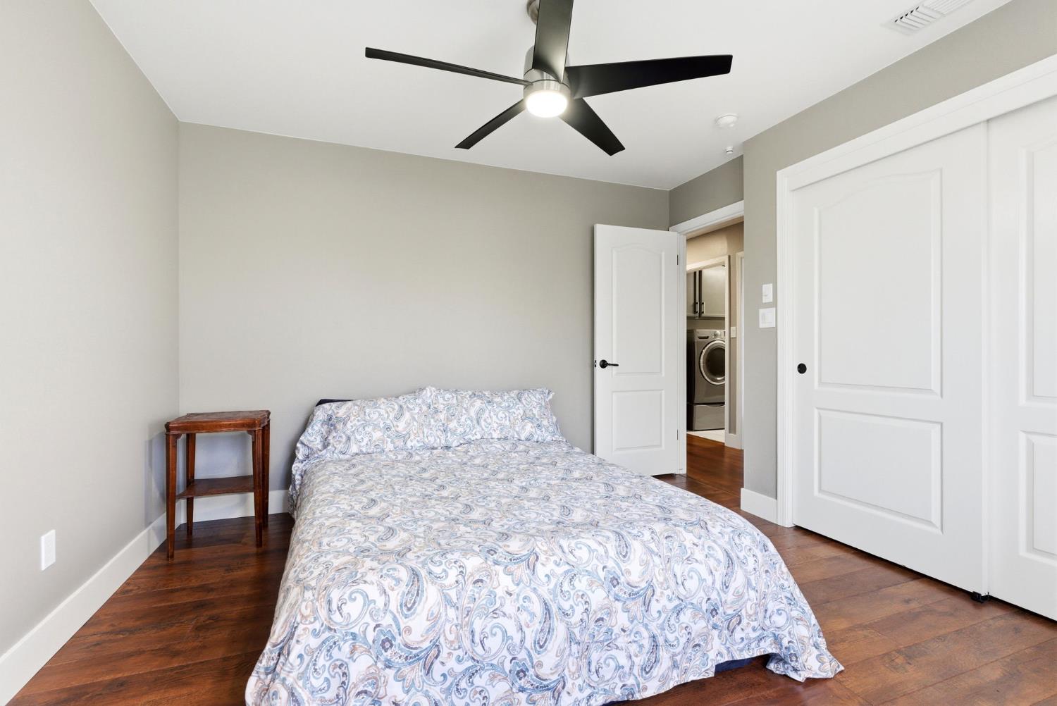 13201 Meacham Road Bakersfield, CA 93314 - Photo 36 of 62 a bedroom with a bed and a table