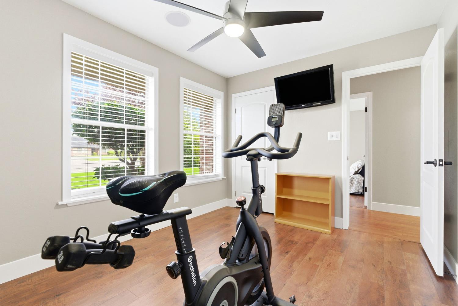 13201 Meacham Road Bakersfield, CA 93314 - Photo 38 of 62 a view of a livingroom with workspace and a window