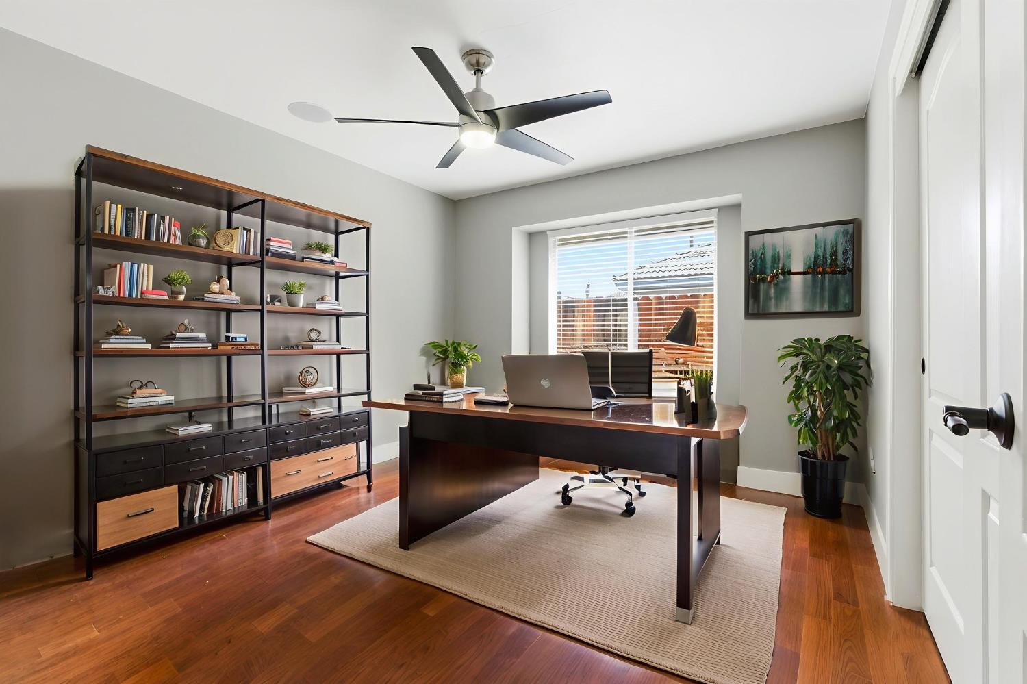 13201 Meacham Road Bakersfield, CA 93314 - Photo 41 of 62 a view of a workspace with furniture window and wooden floor