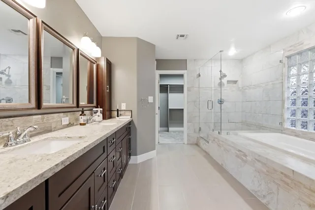 an aerial view of house with yard