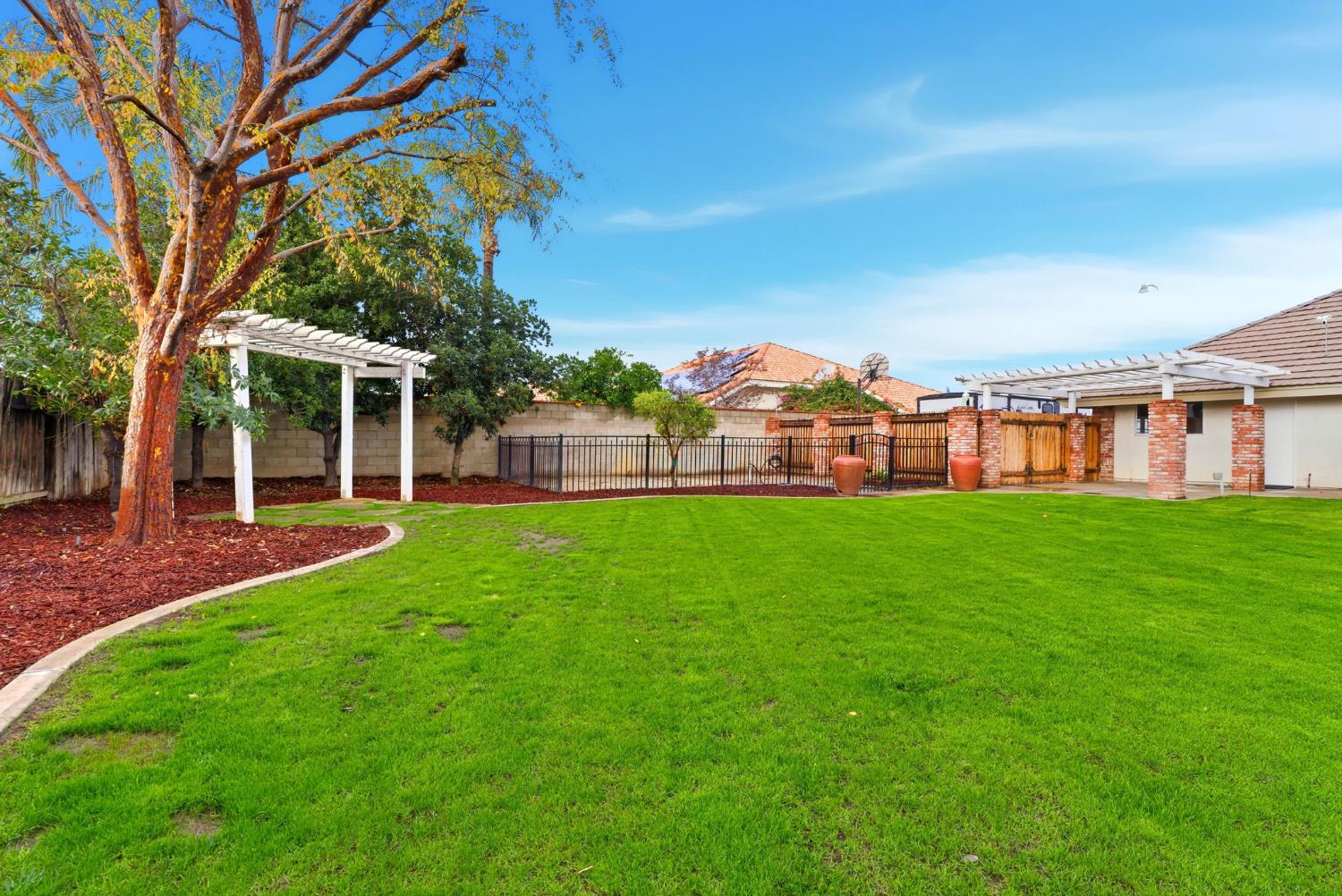 13201 Meacham Road Bakersfield, CA 93314 - Photo 60 of 62 a view of a house with a big yard