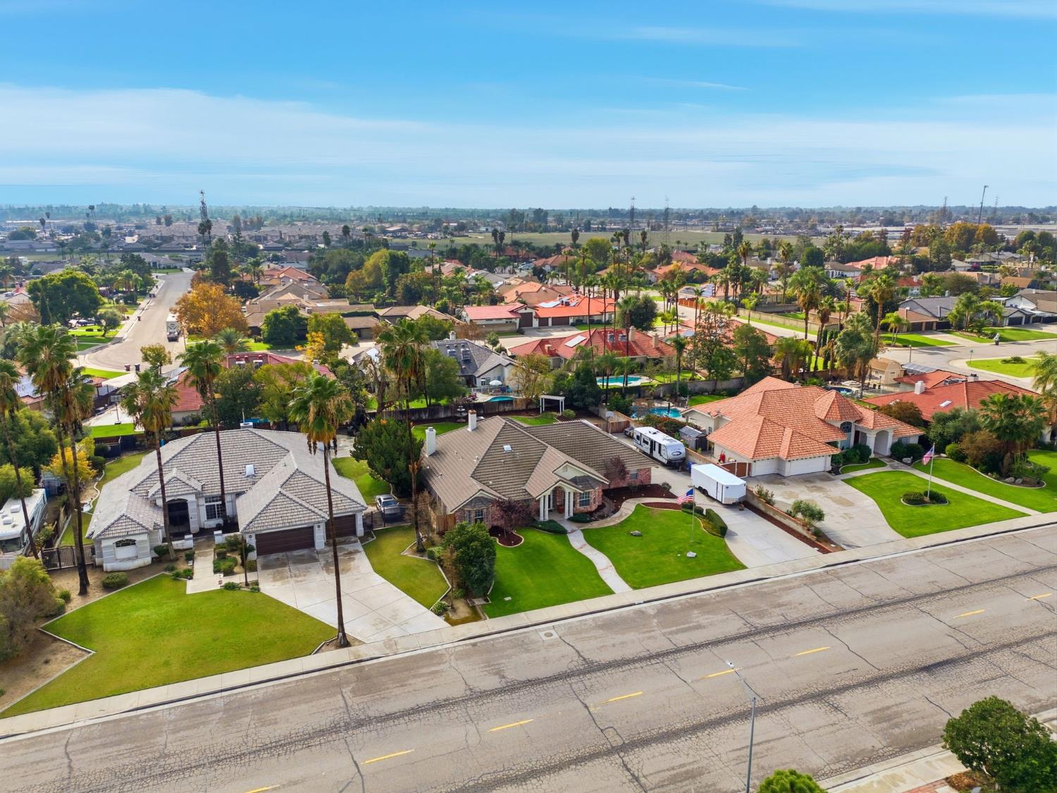 13201 Meacham Road Bakersfield, CA 93314 - Photo 7 of 62 an aerial view of a house with a garden and lake view
