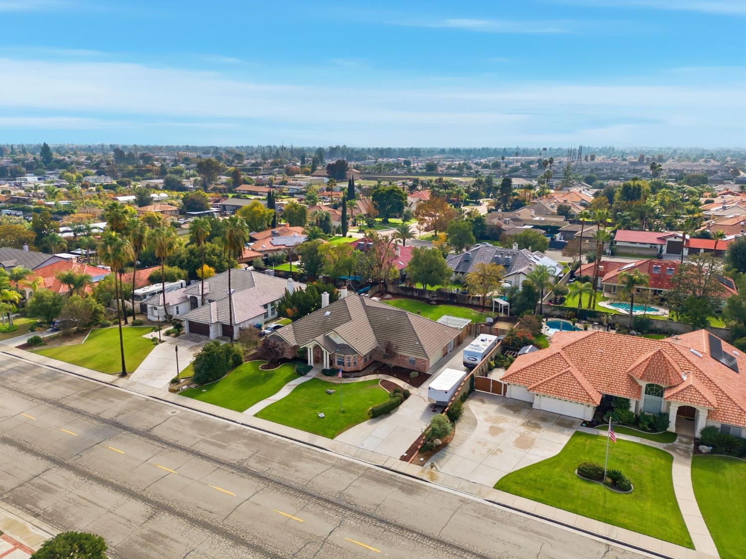 13201 Meacham Road Bakersfield, CA 93314 - Photo 9 of 62 an aerial view of residential houses with yard