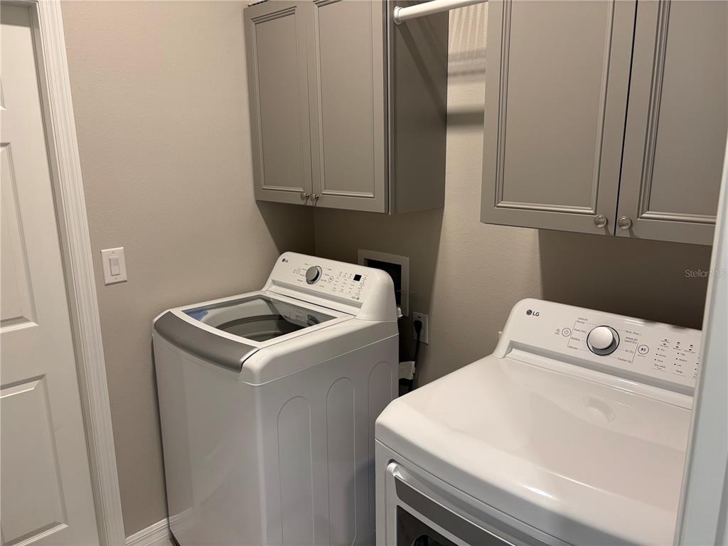 7819 Southwest 88th St Road Ocala, FL 34476 - Photo 20 of 30 a utility room with dryer and washer