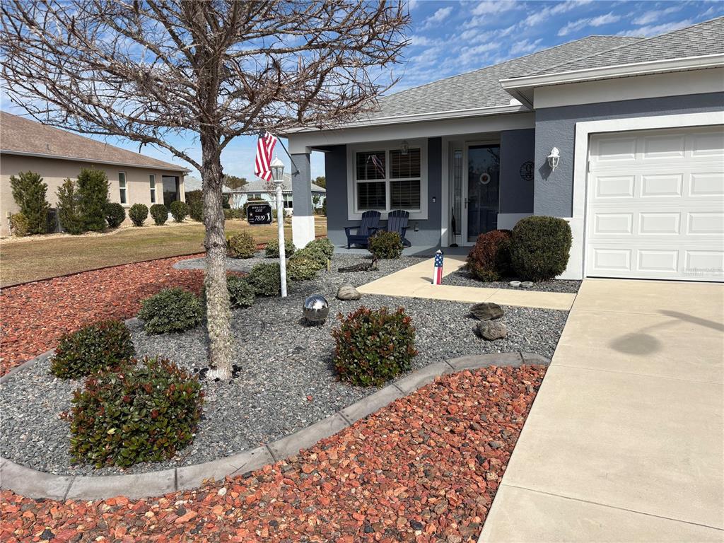 7819 Southwest 88th St Road Ocala, FL 34476 - Photo 3 of 30 a view of a chairs and table in backyard