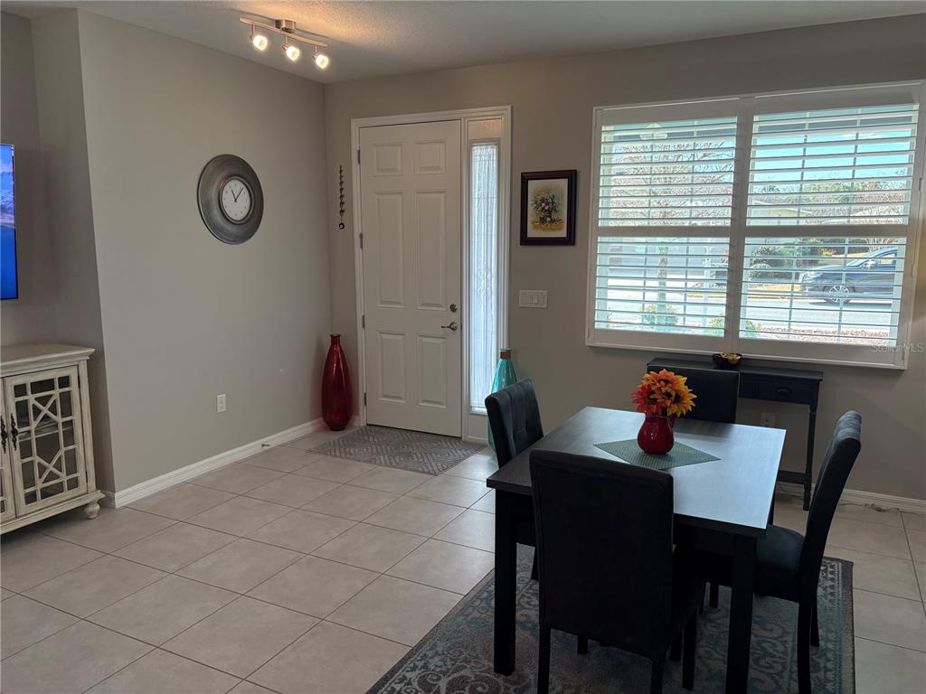 7819 Southwest 88th St Road Ocala, FL 34476 - Photo 6 of 30 a view of a room with furniture and window