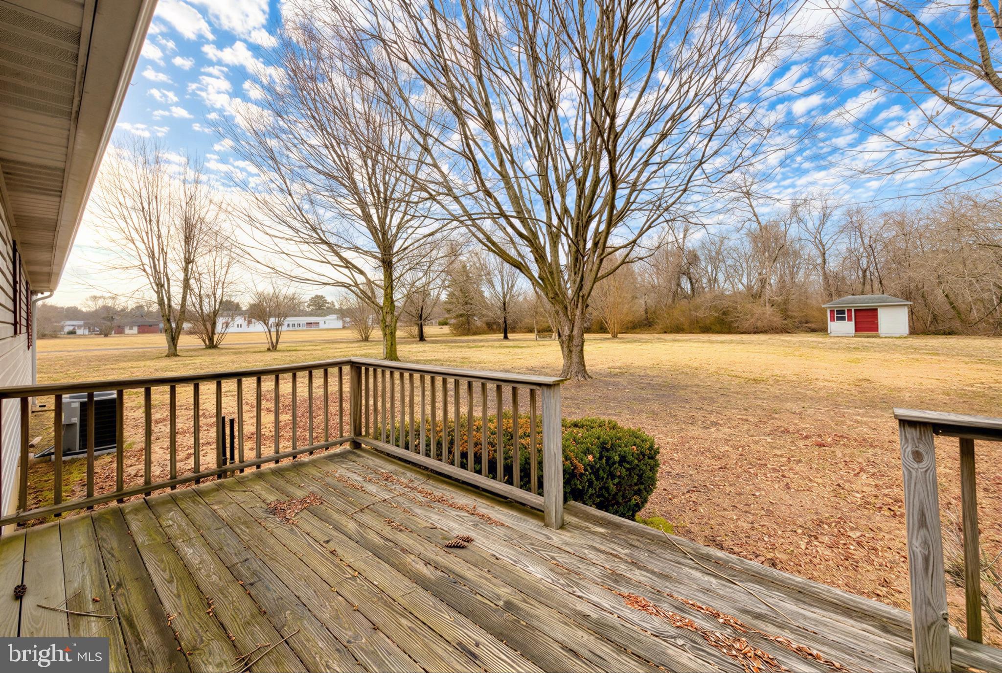 7615 Mill Creek Road Benedict, MD 20612 - Photo 30 of 37 a view of a balcony with wooden fence