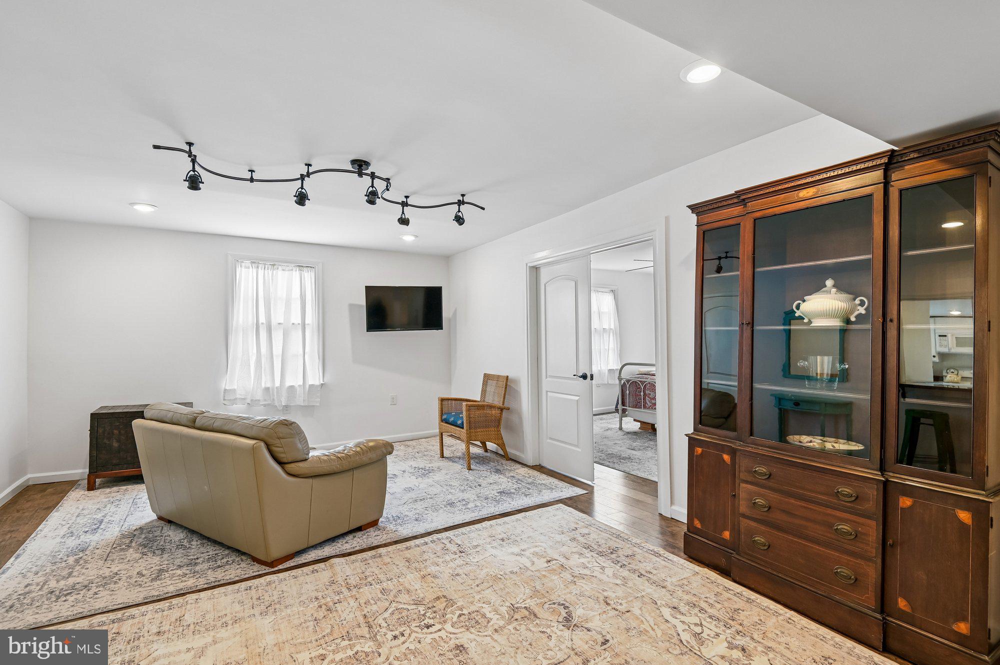 8 Fleet Street Annapolis, MD 21401 - Photo 11 of 37 a living room with furniture and a flat screen tv