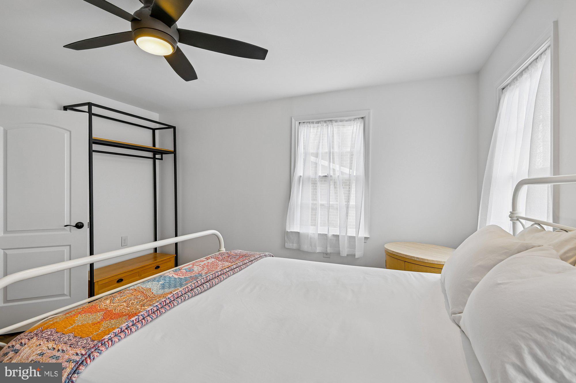 8 Fleet Street Annapolis, MD 21401 - Photo 26 of 37 a bedroom with a bed and a large window