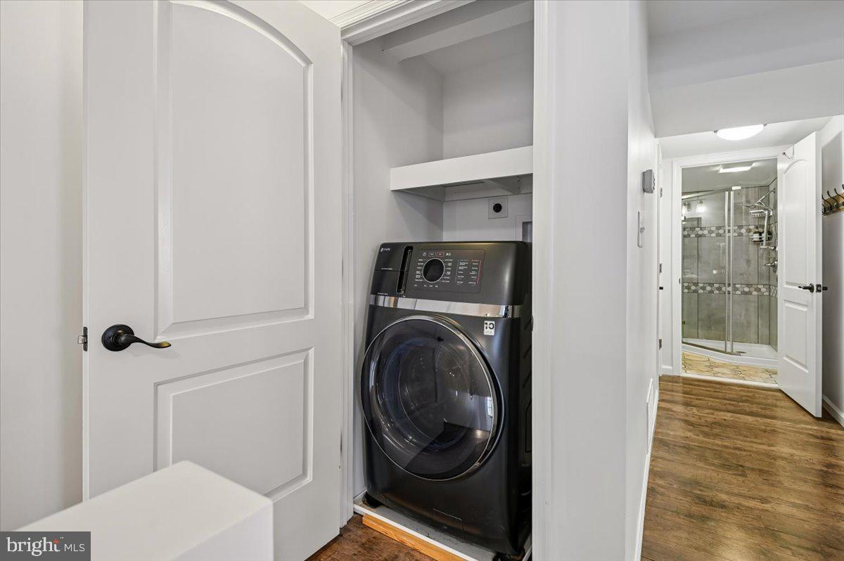 8 Fleet Street Annapolis, MD 21401 - Photo 35 of 37 a view of a hallway with washer and dryer
