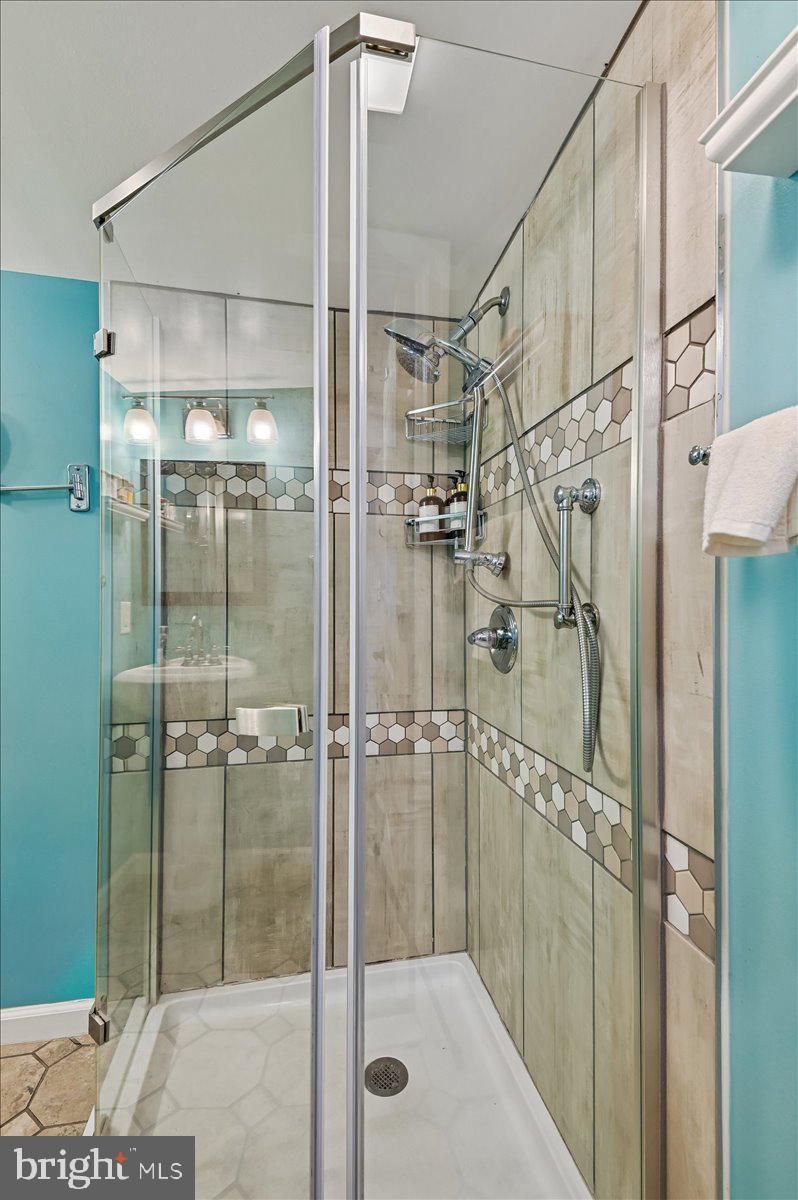 8 Fleet Street Annapolis, MD 21401 - Photo 37 of 37 a bathroom with a shower and a glass door
