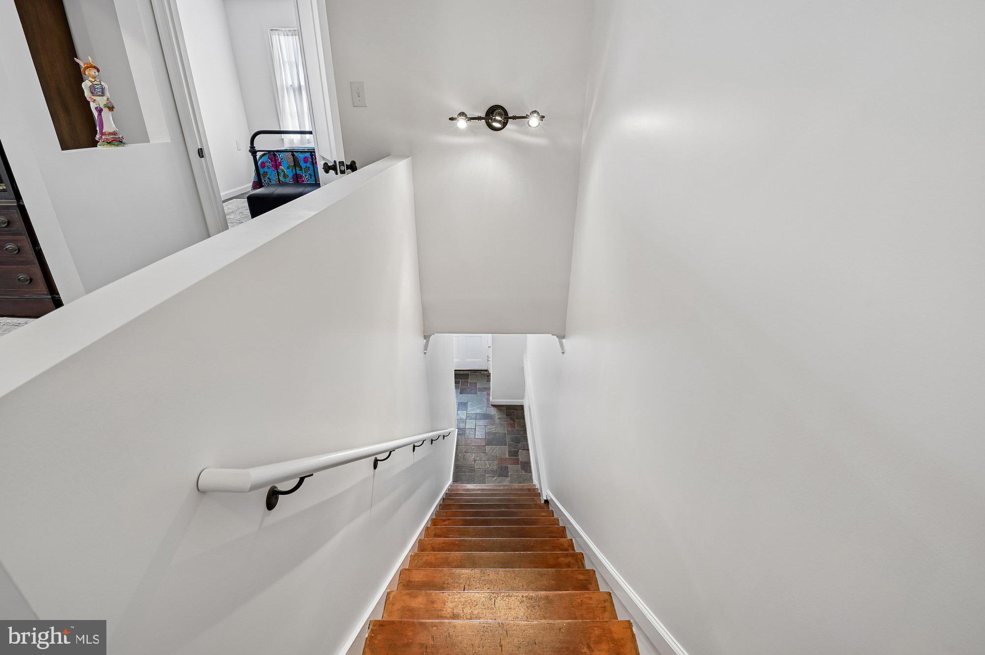 8 Fleet Street Annapolis, MD 21401 - Photo 5 of 37 a view of a hallway with stairs