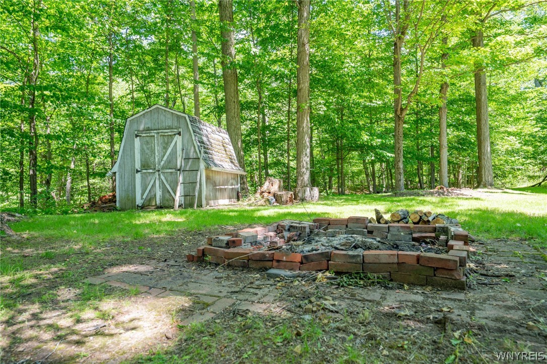 1928 Reading Road West Falls, NY 14170 - Photo 33 of 37 Shed, firepit, overlooking creek